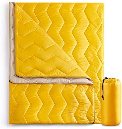Waterproof puffy camping blanket in yellow